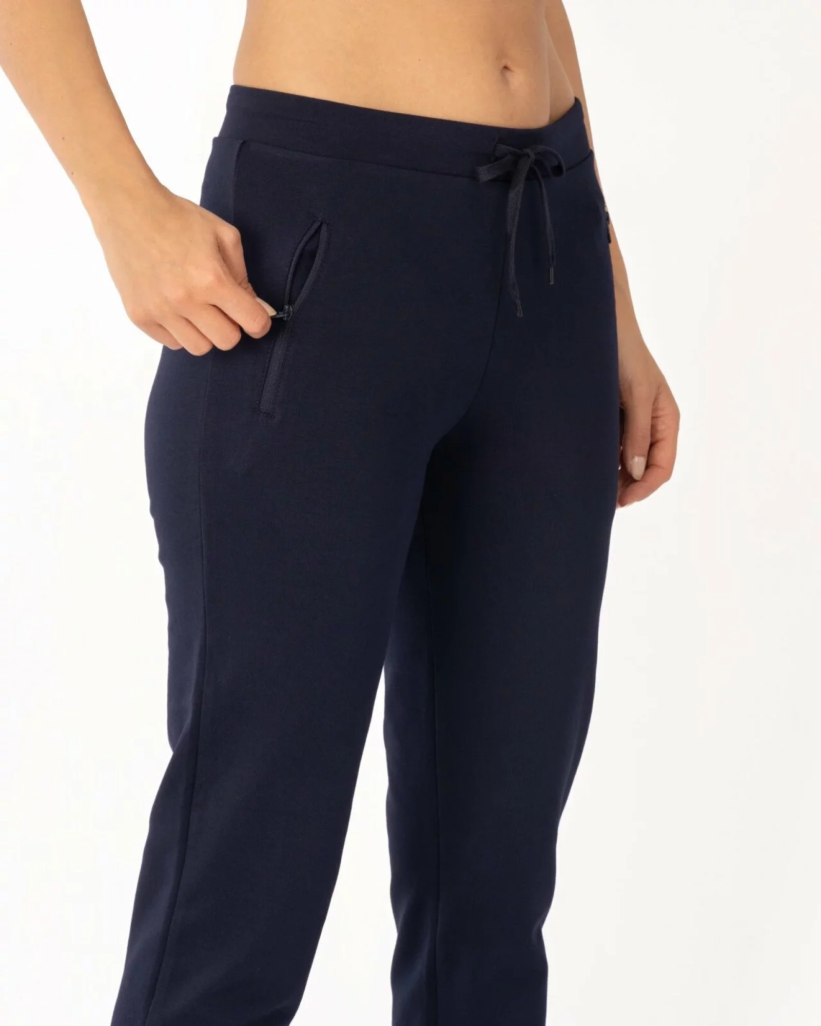 Pantaloni de trening bleumarin conici, interior buclat, cu buzunare cu fermoar